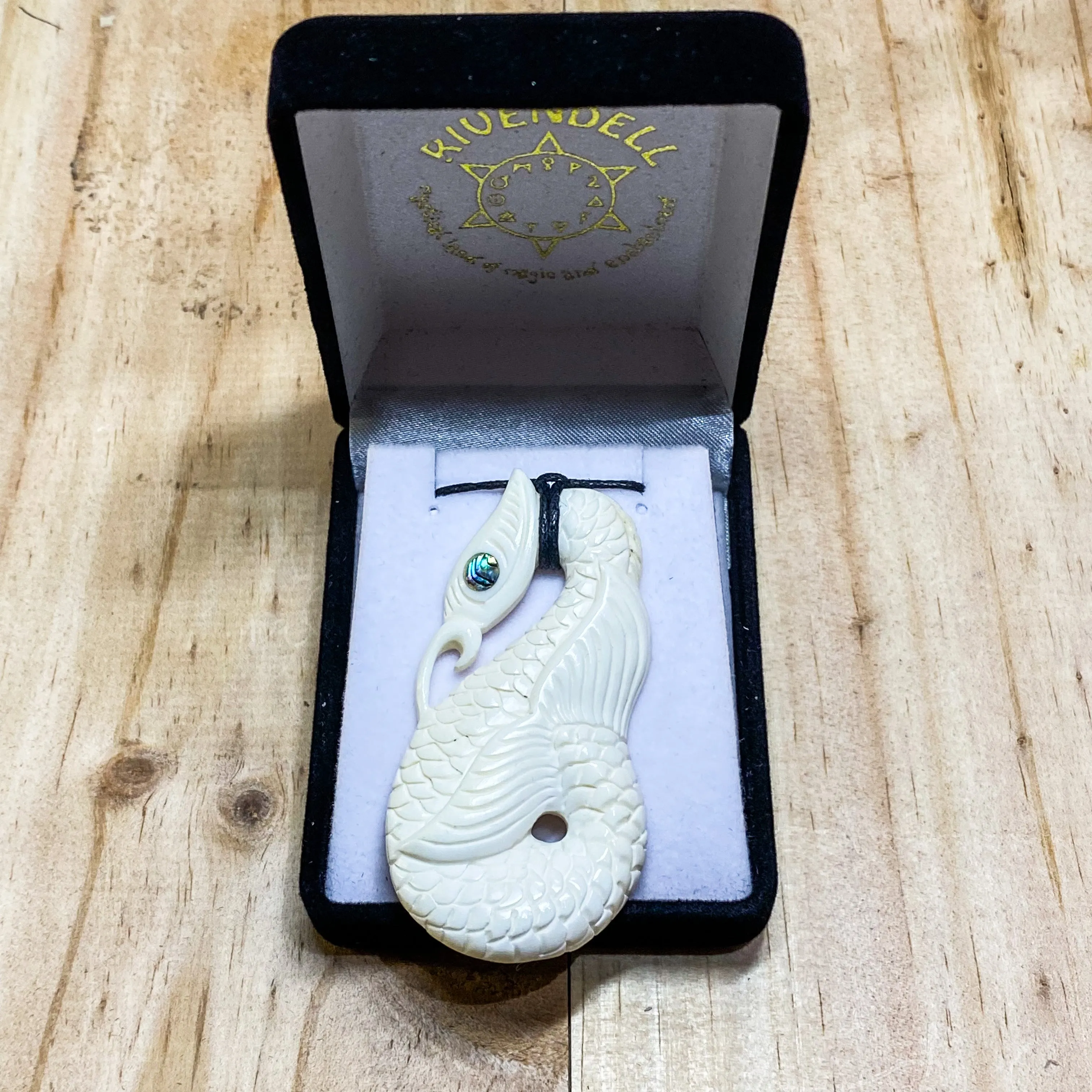 Handcarved Intricate Bone Carving Pendant w Paua Eye - Manaia